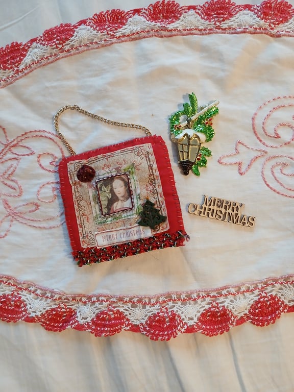 Hand-stitched red fabric christmas decoration 