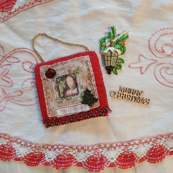 Hand-stitched red fabric christmas decoration 