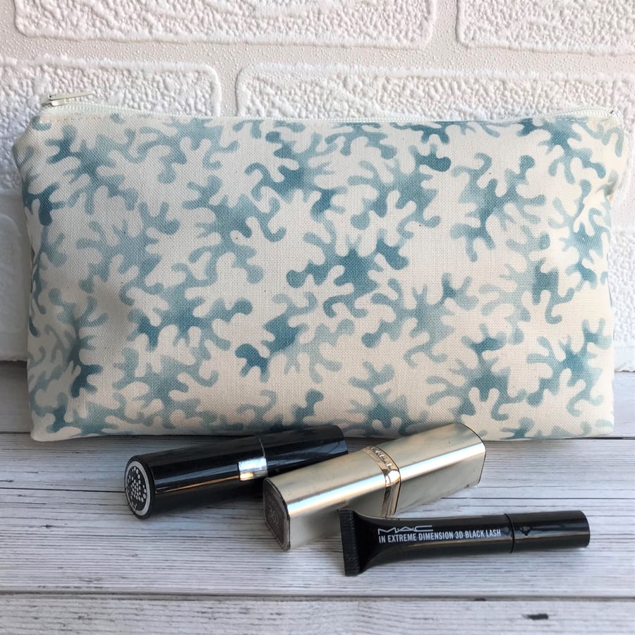 Cream and blue abstract patterned make up bag, cosmetic bag