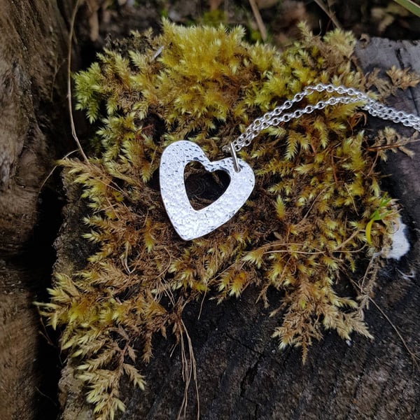 Sterling silver hammered heart necklace.