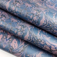 Rococo swirls design wrapping paper in blue and orange