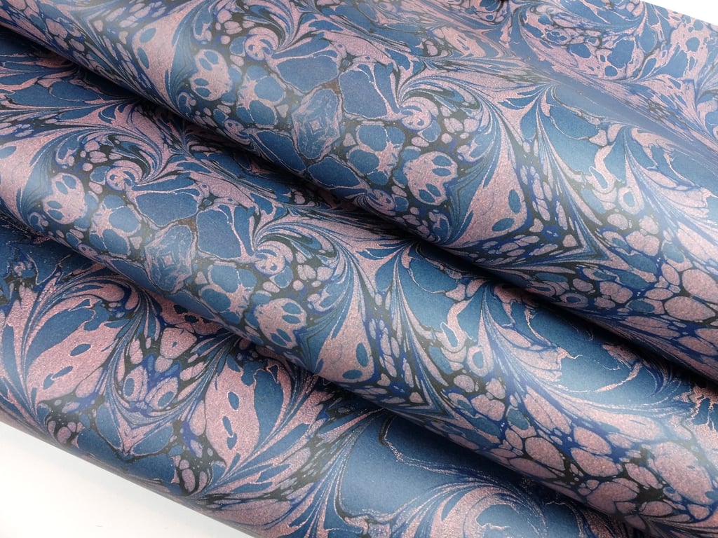 Rococo swirls design wrapping paper in blue and orange