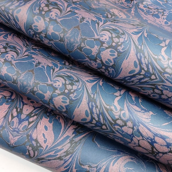 Rococo swirls design wrapping paper in blue and orange