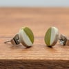 Half olive green stud earrings 