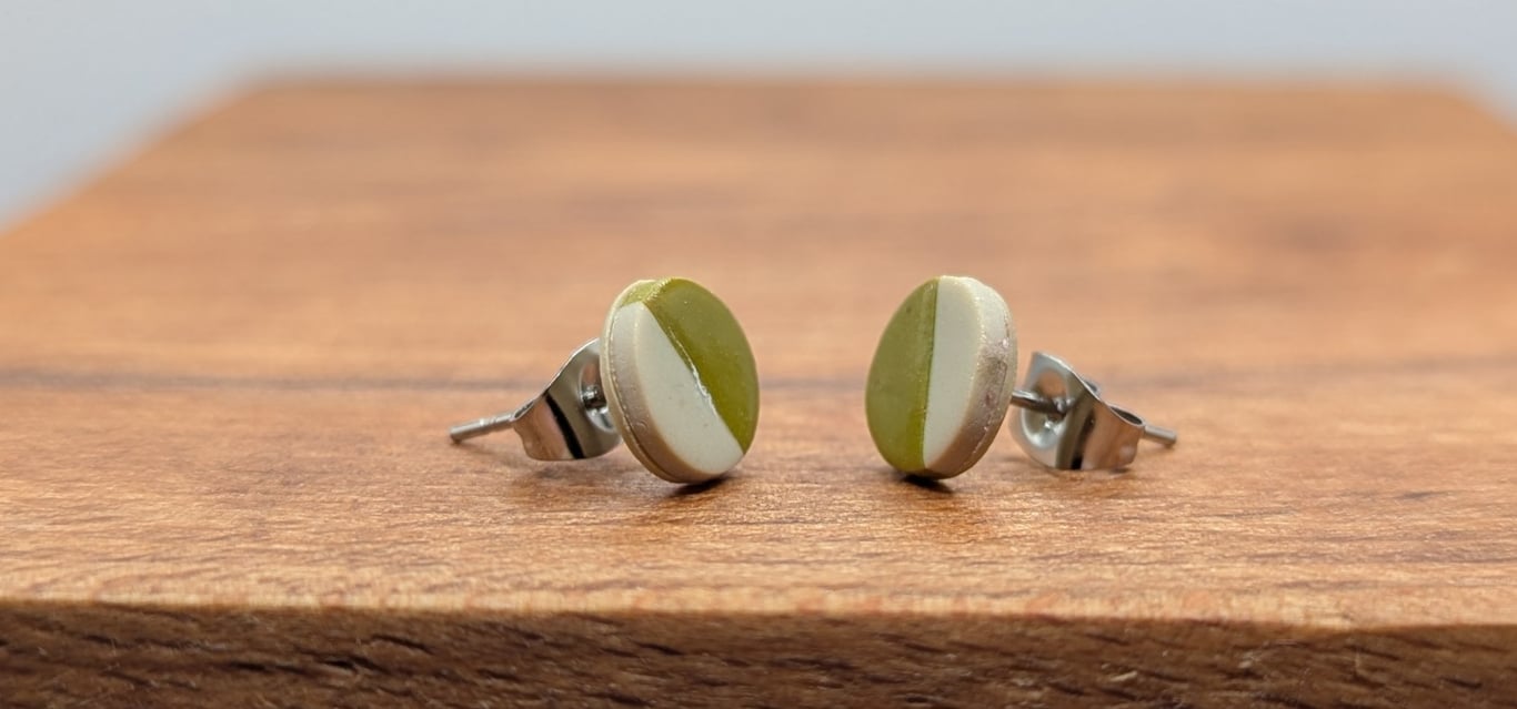 Half olive green stud earrings 