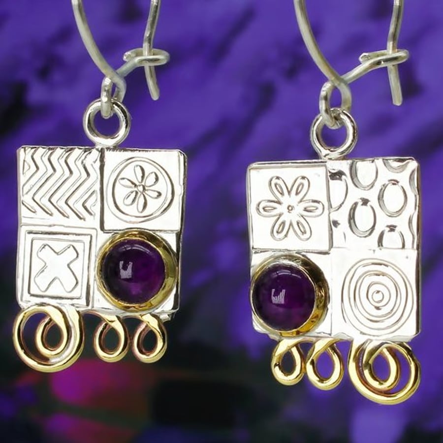 Handmade sterling silver earrings featuring Amethyst gemstones and hoops. M.S.