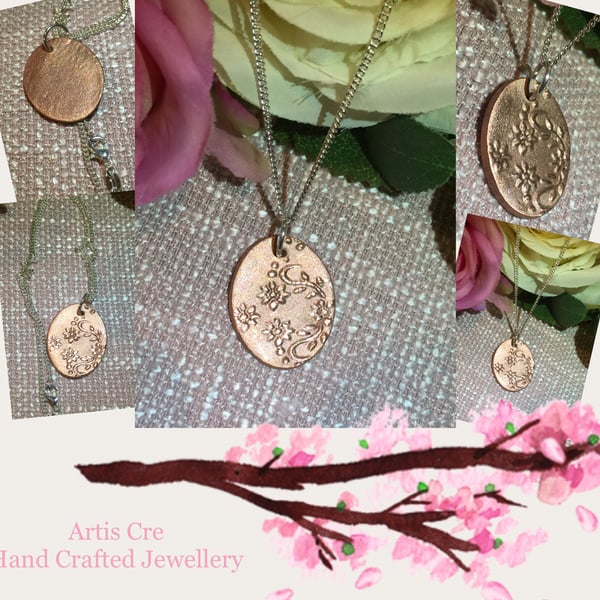 Hand crafted floral embossed oval Copper pendant sterling silver chain