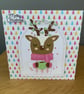 A handmade festive Reindeer Christmas card
