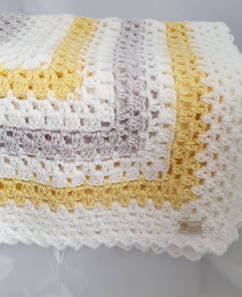 Handmade grey, white and lemon granny square baby blanket