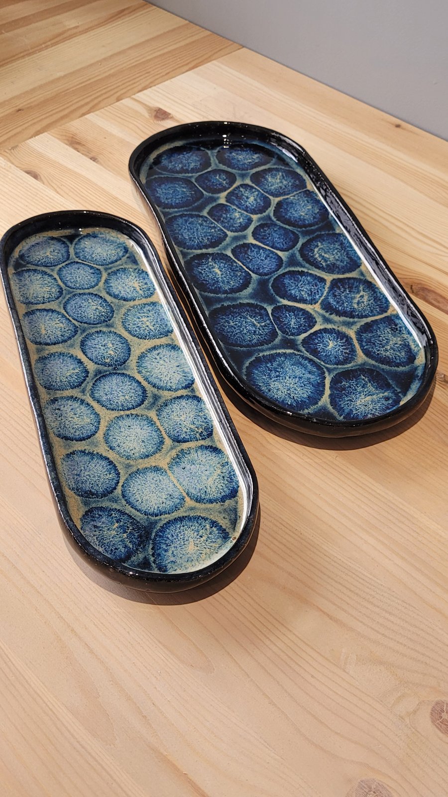 Set of two blue patterned baguette shaped platters handmade pottery