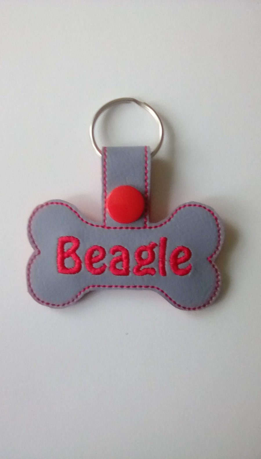 642. Beagle bone shaped keyring.