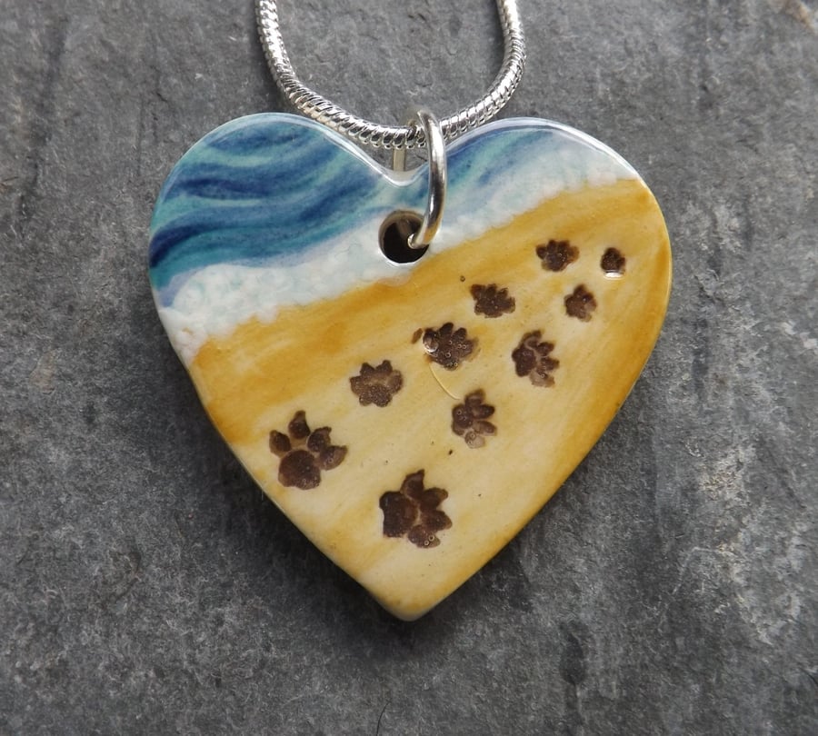 Handmade ceramic paw prints on my heart pendant
