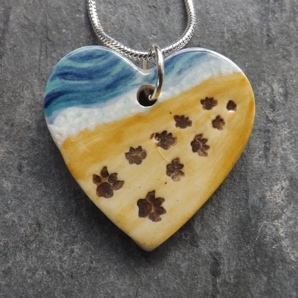 Handmade ceramic paw prints on my heart pendant