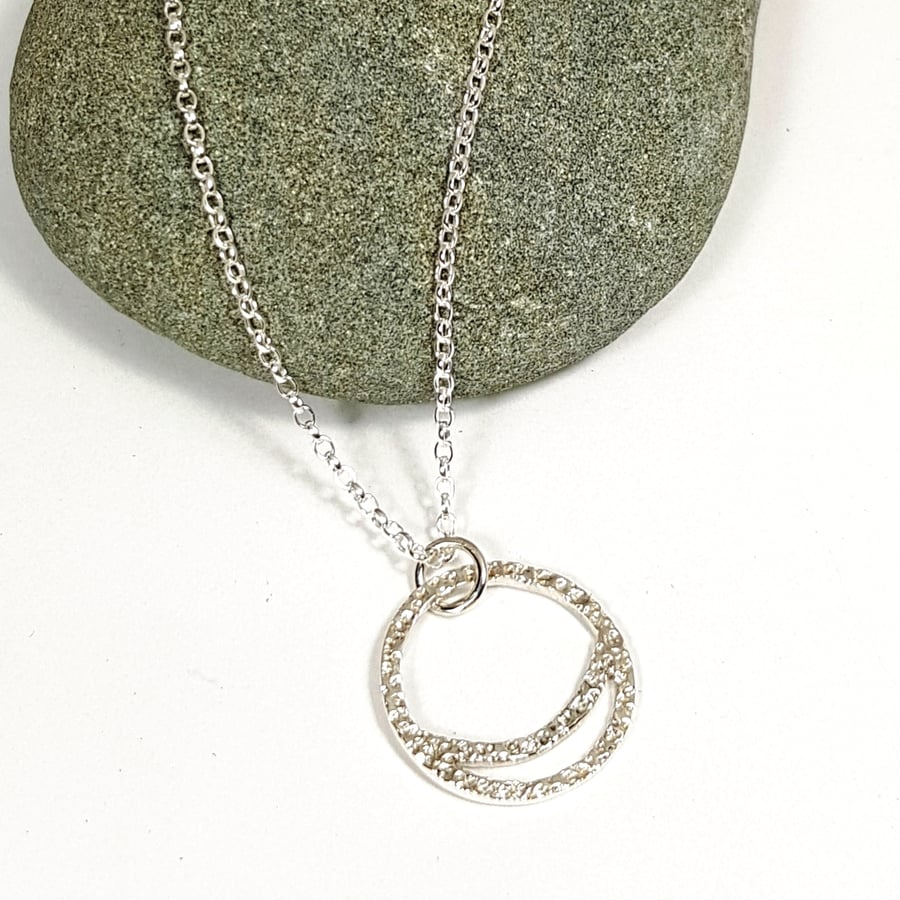 Sterling silver circle pendant on sale necklace