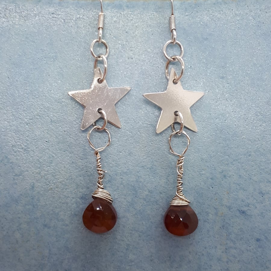 Silver star and garnet earrings