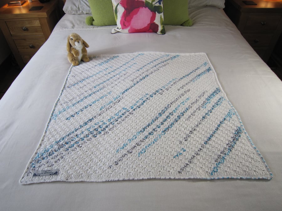 Square Baby Blanket, white with blue splash design, hand crocheted