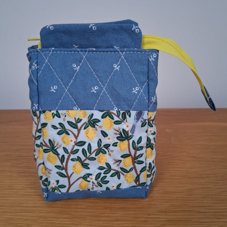Lemons on blue quilted zipped pouch