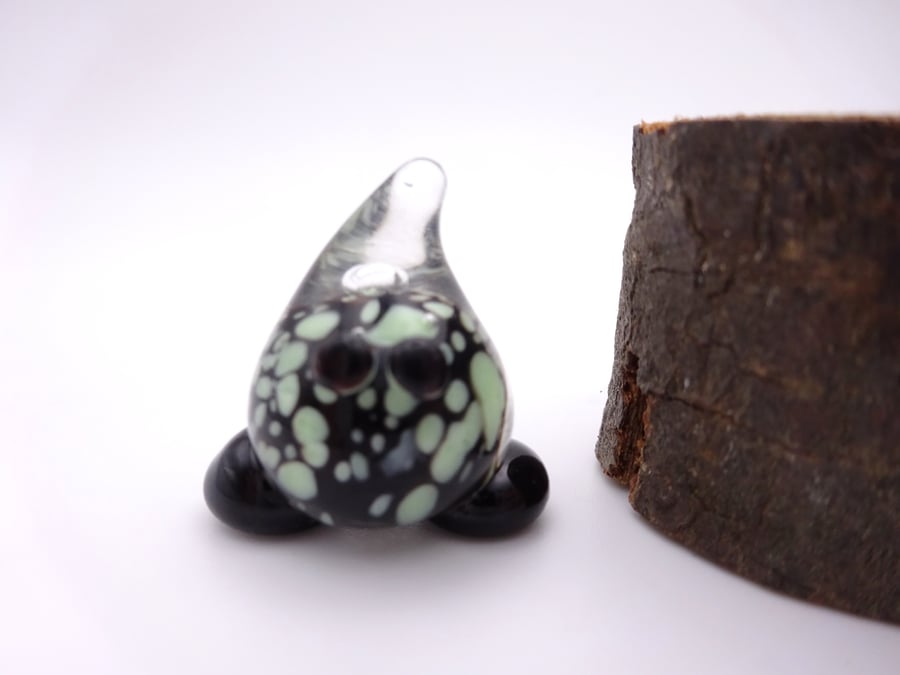 small glass wisp figure