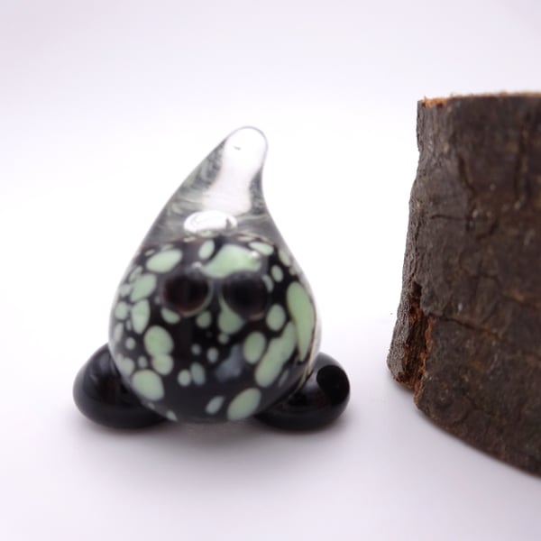 small glass wisp figure