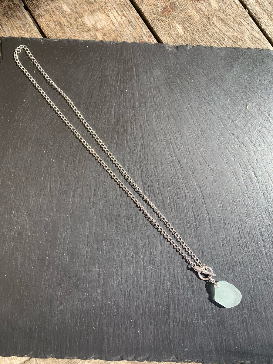 Blue-green seaglass drop on silver plated mount & toggle fastening chain
