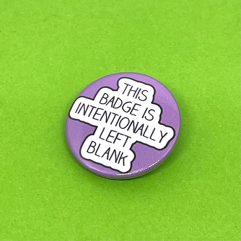 This badge is intentionally left blank badge. Badge, pocket pebble, keyring