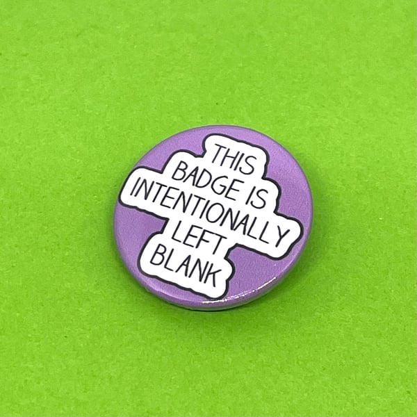 This badge is intentionally left blank badge. Badge, pocket pebble, keyring