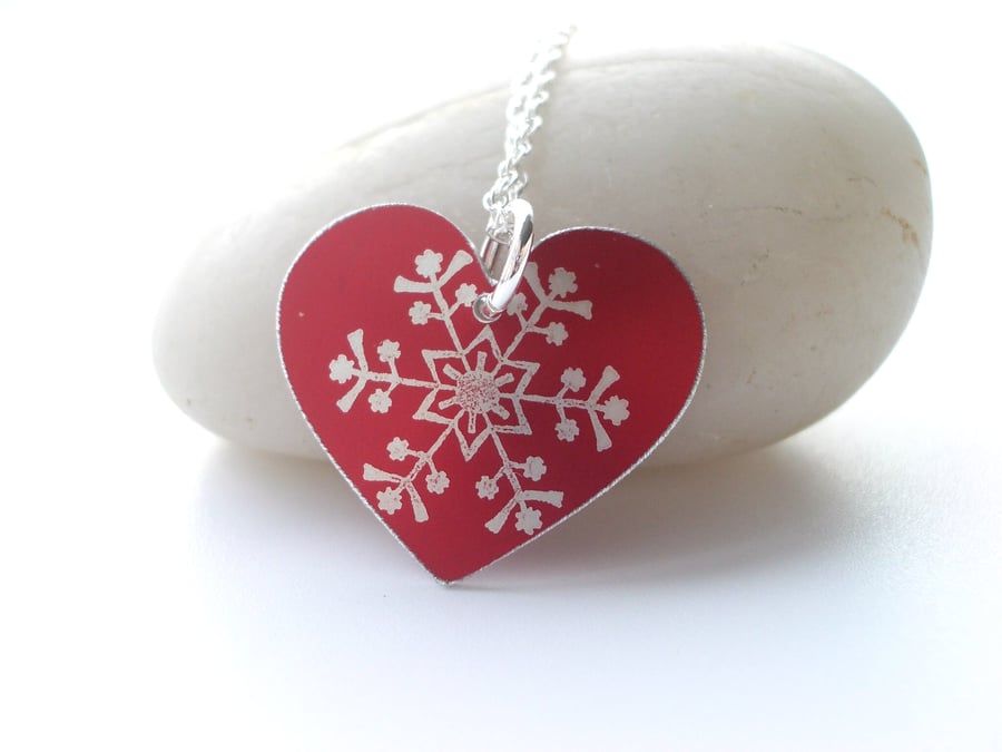 Christmas snowflake heart pendant in red