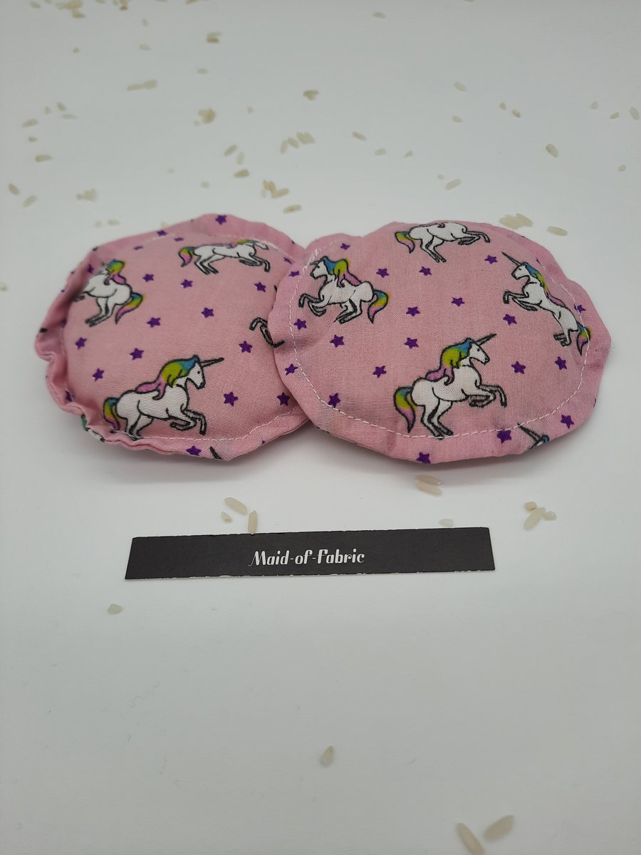 Heat pads  - hand warmers, rice filled in unicorn fabric. 