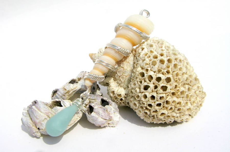Wire wrapped shell pendant necklace with pale aqua sea glass polymer drop