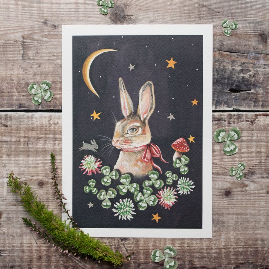 A5 mini print of a rabbit nestled in clover in the starry night