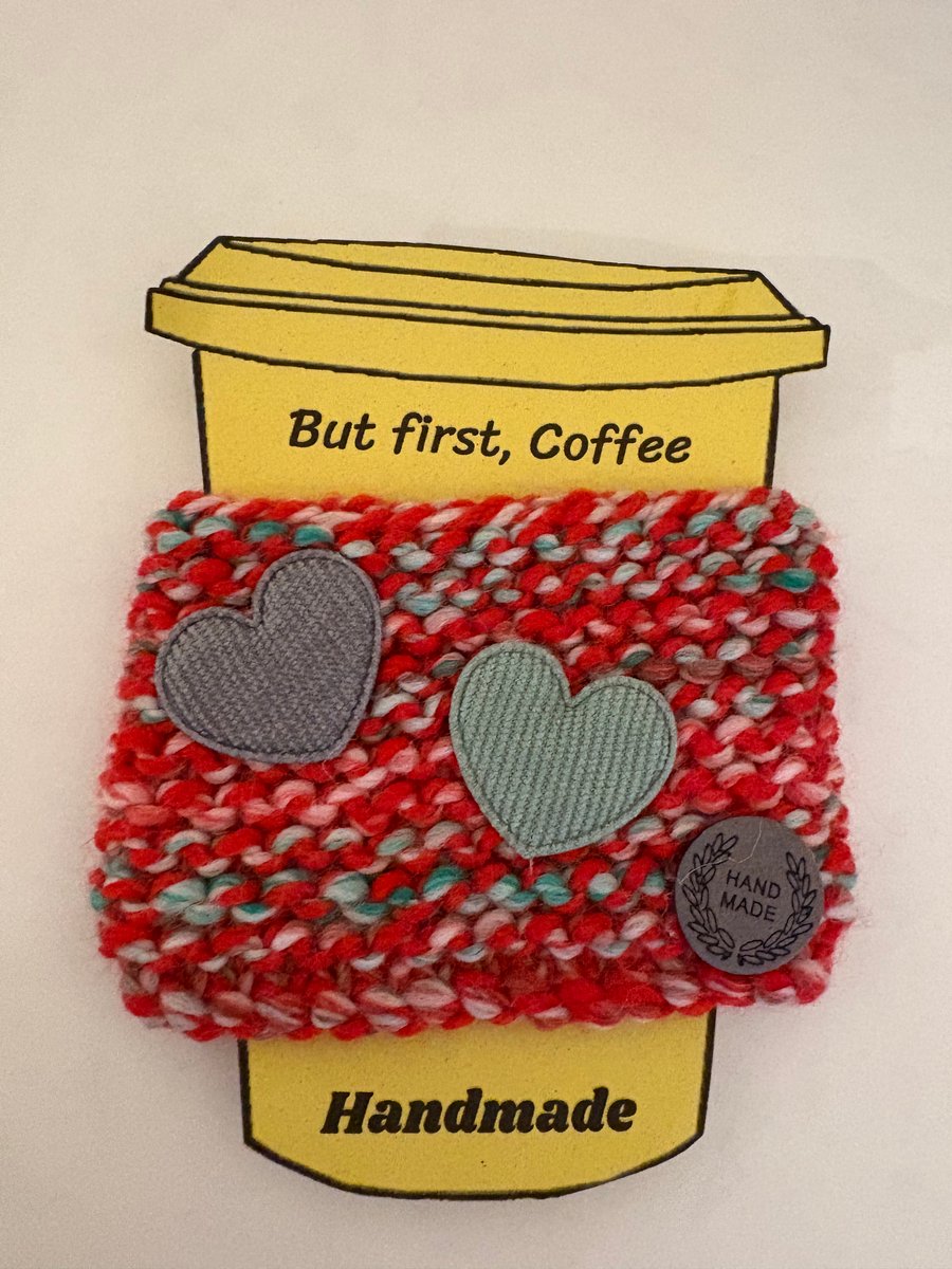 Two hearts knitted cup cosy. 