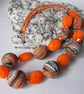 Handmade necklace in orange, black and white polymer clay - Image 4