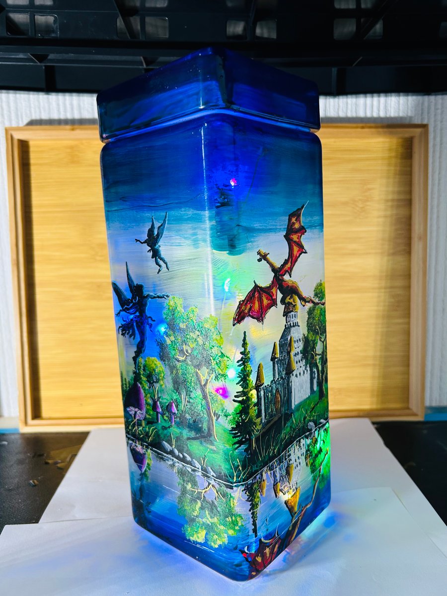 A hand painted and fired glass piece with glass lid by Andrew Jenkins 