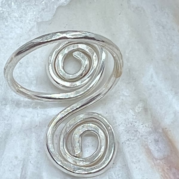 Spiral adjustable ring