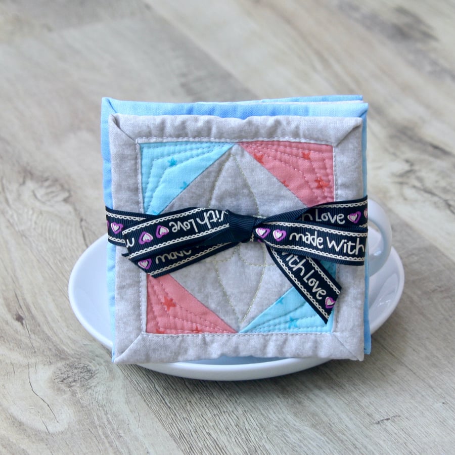 Set of Four Blue, Pink and Grey patchwork coasters with Stars pattern