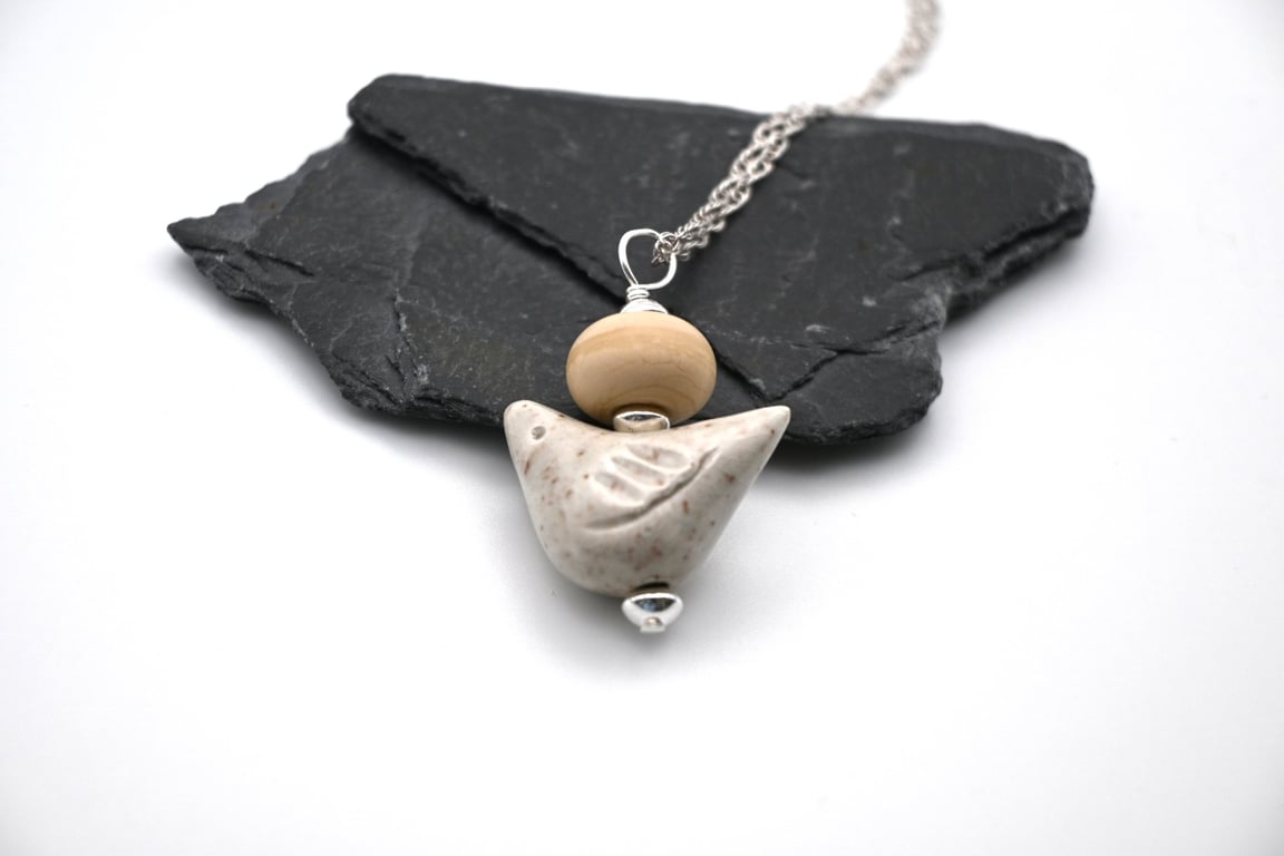 cream ceramic bird necklace
