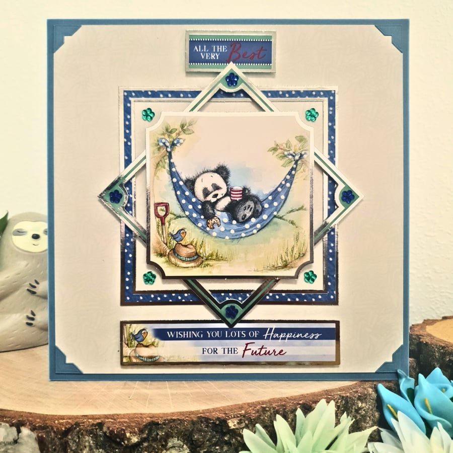 Retirement Card With A Panda Relaxing In A Blue Spotty Hammock 