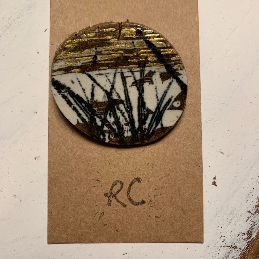 Ceramic Landscape Brooch decorated with 23.5 carat gold leaf