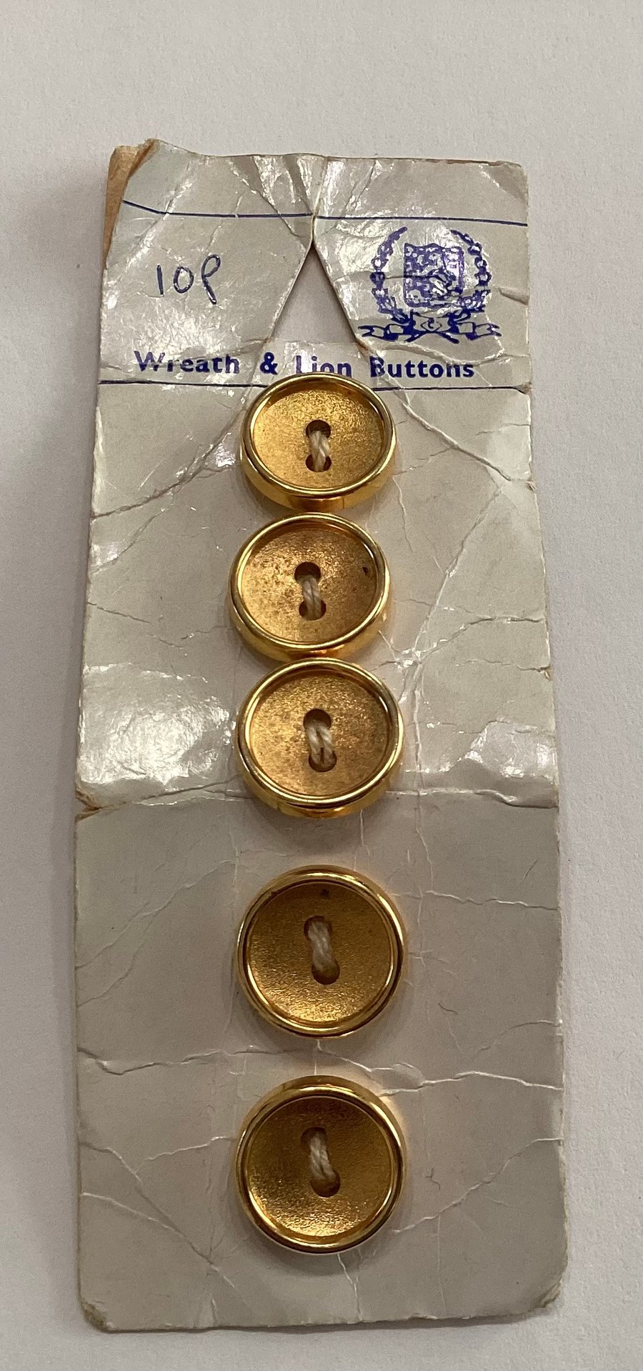 Buttons, gold coloured,  set of five