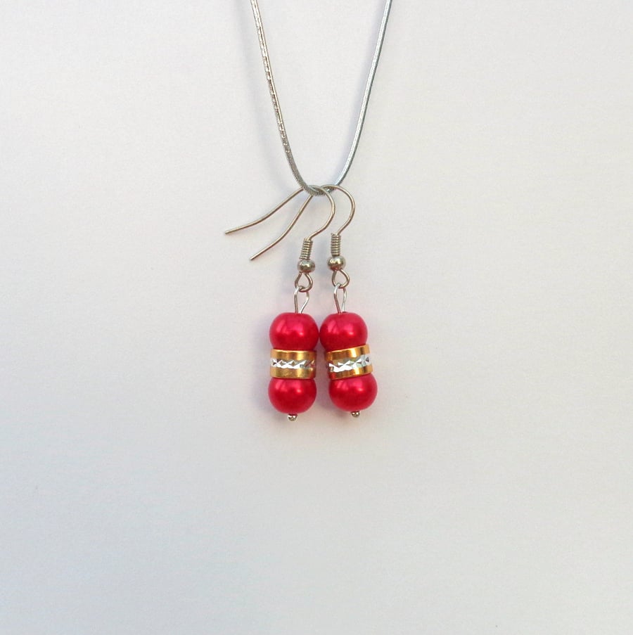 Earrings. Bright red glass pearls with gold & silver trim 