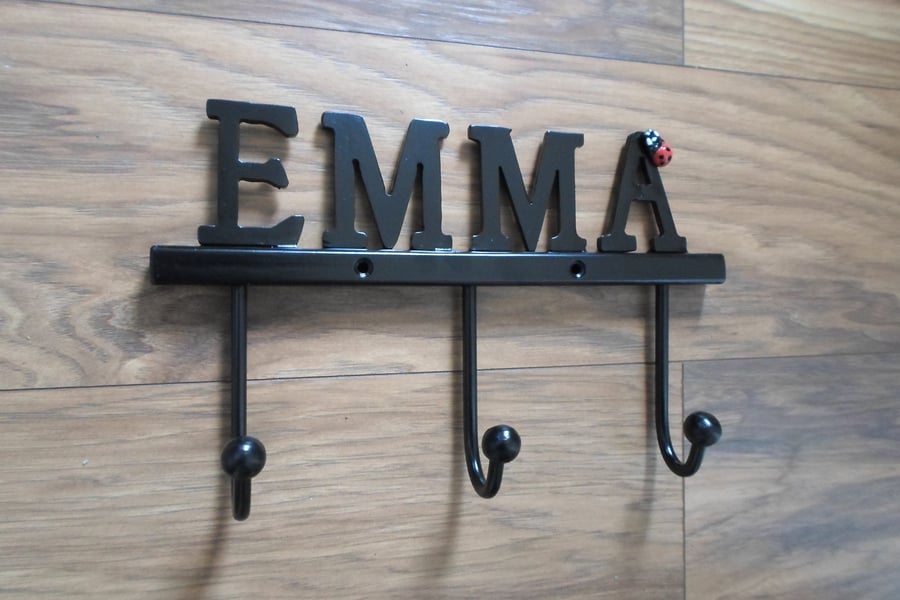 Custom Lettered Coat Rail ..........................Wrought Iron (Forged Steel) 