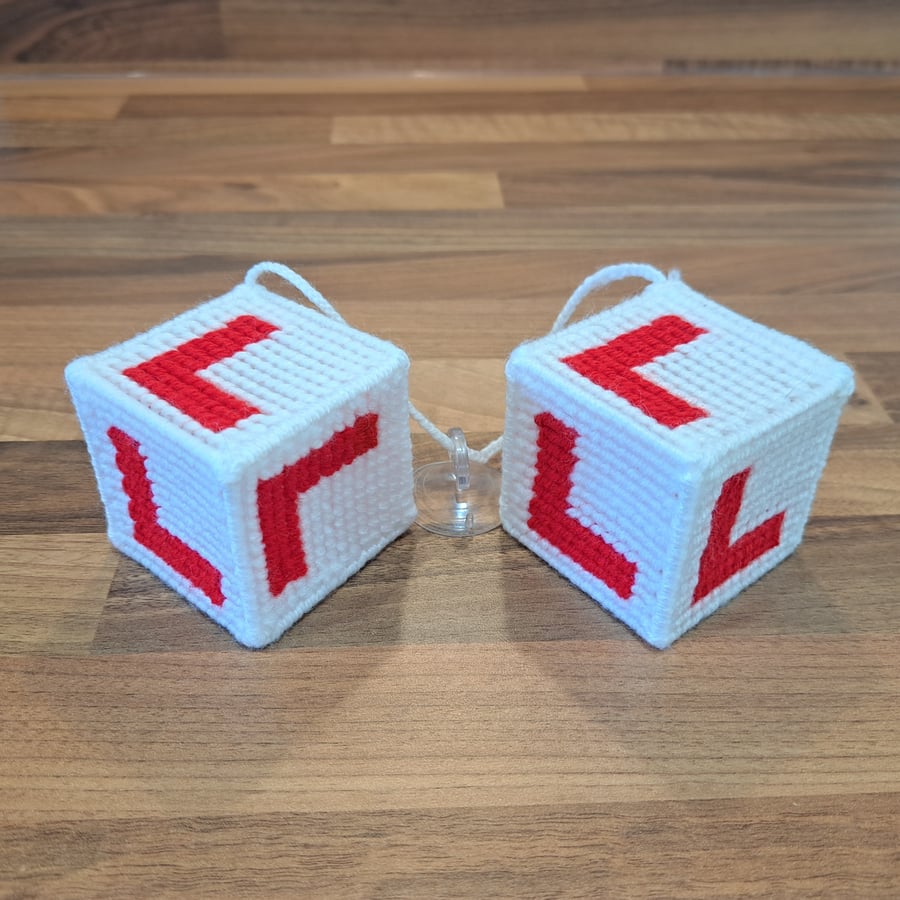 Novelty car decoration for learner drivers, with sucker-cup attachment