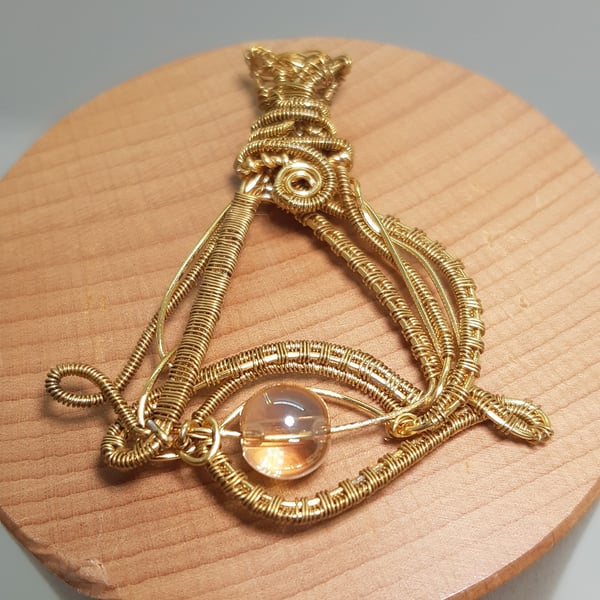 Wire wrapped pendant, eye pendant