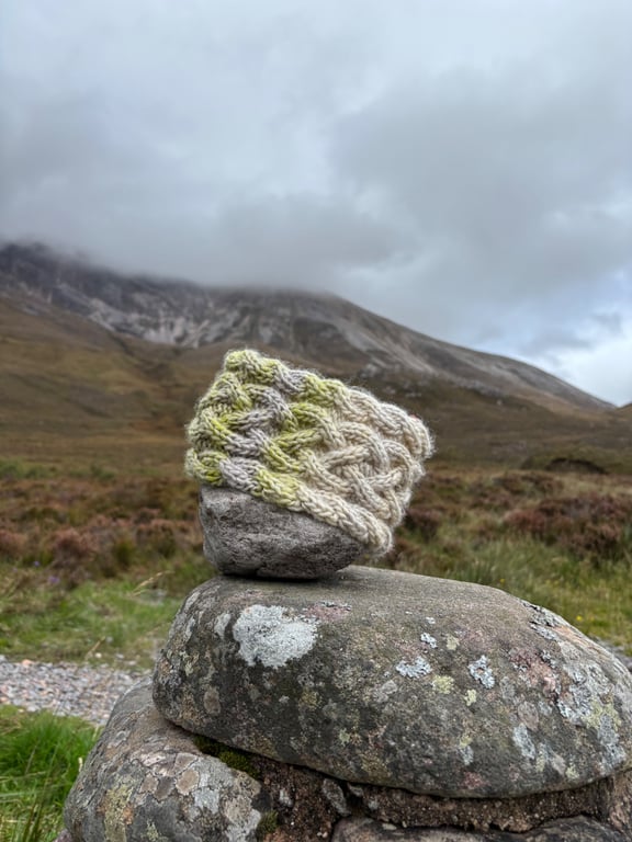 Hand knitted, lined headband featuring Celtic knot pattern 