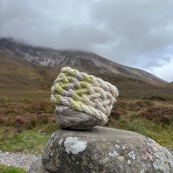 Hand knitted, lined headband featuring Celtic knot pattern 