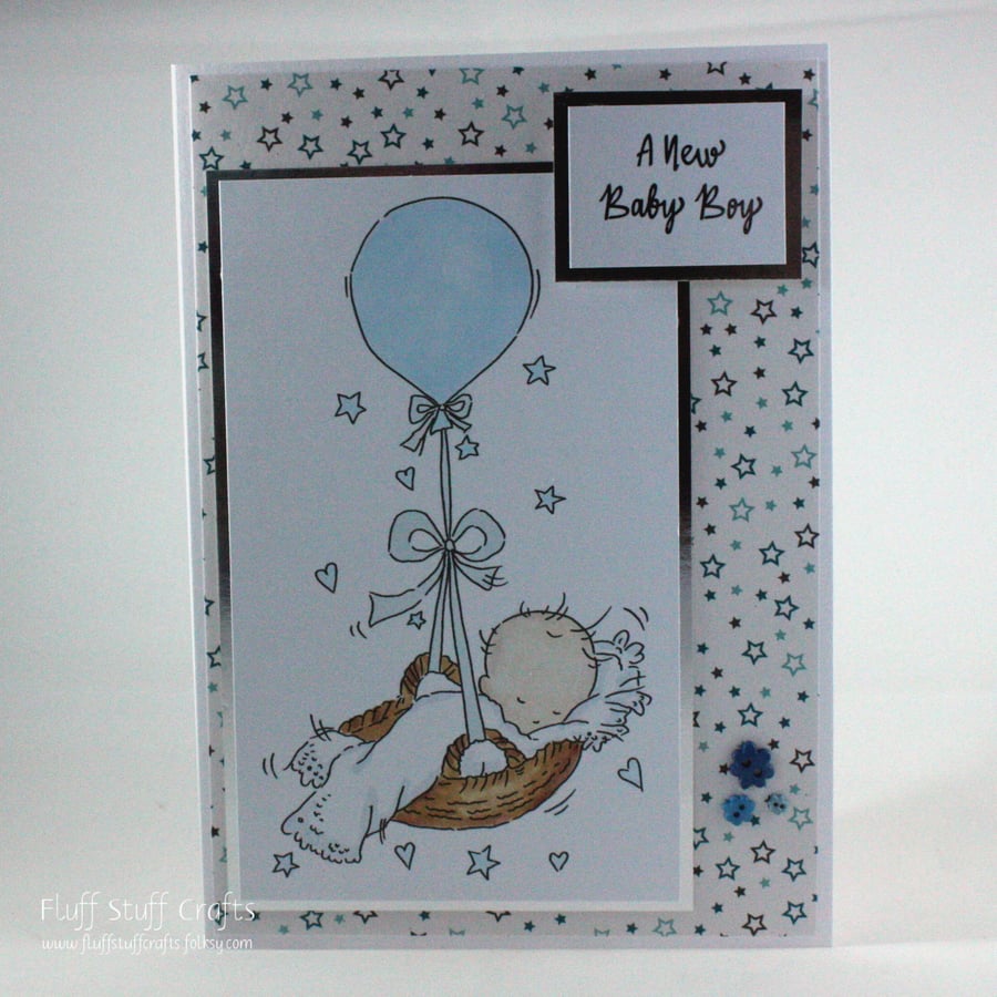 New baby boy card - baby in balloon basket