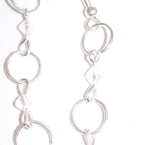 Silver and clear circle dangle earrings