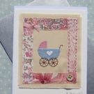 Little pram embroidered card to welcome a new baby, silk bow and mop button