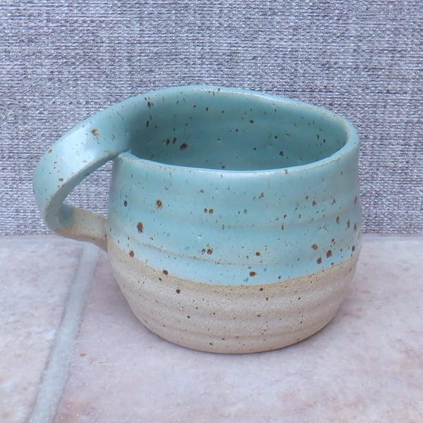 Left handed coffee mug tea cup in stoneware hand thrown ceramic pottery