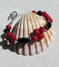 Natural Red Coral & Black Onyx Gemstone Beaded Bracelet "Red Twilight" - Image 1